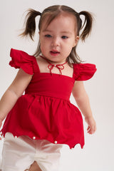 Blusa roja perlas
