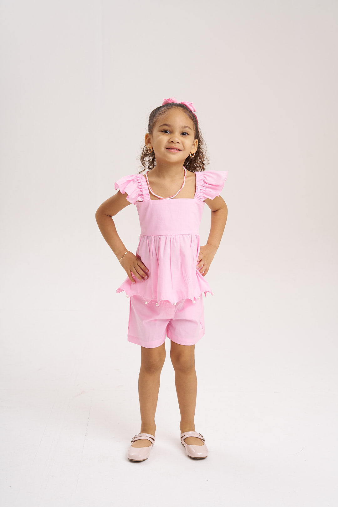 Blusa rosa perlas